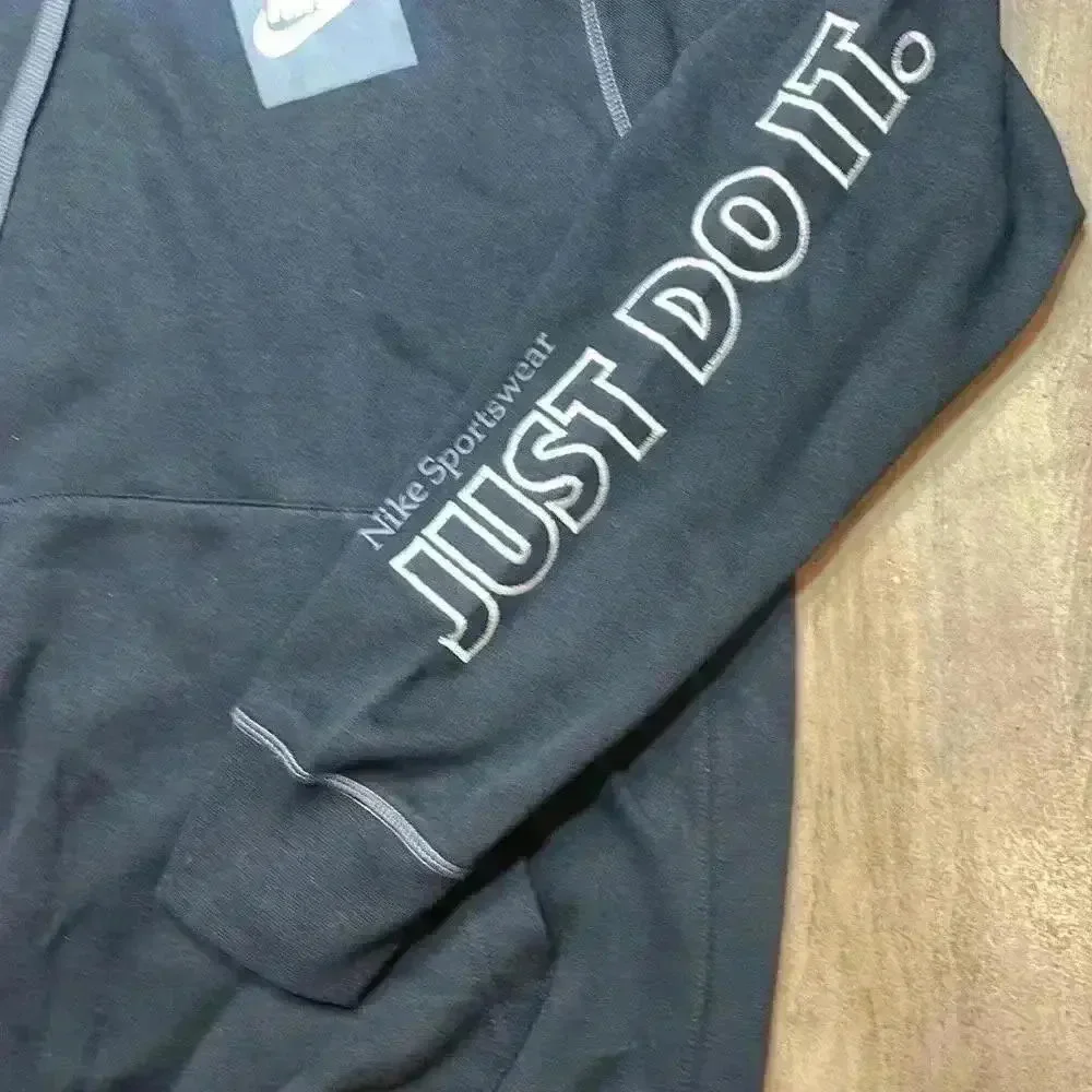 Nike hoodie, black with white lettering size Medium, perfect condition!